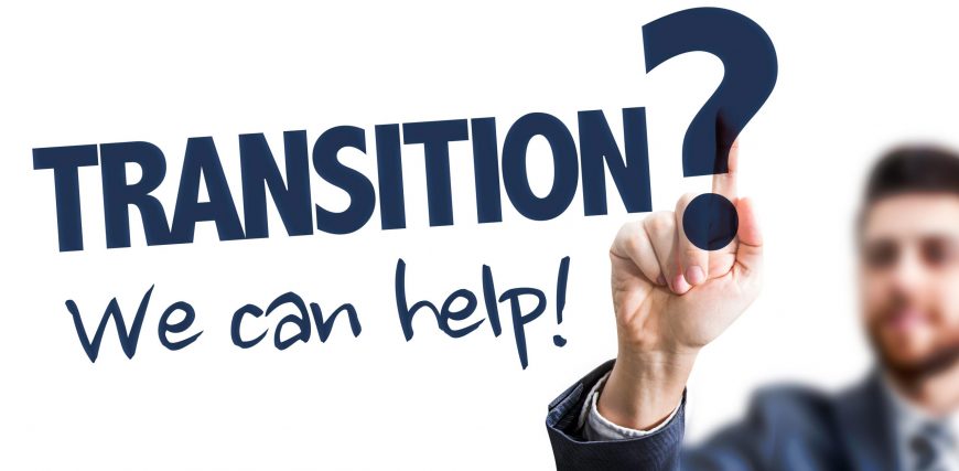 Business Man Pointing the Text: Transition? We Can Help!